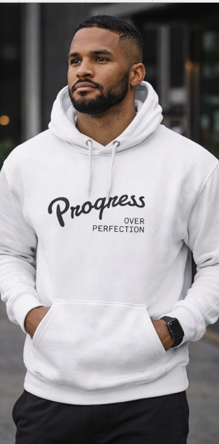 Man in Progress Over Perfection white hoodie standing motivational streetwea