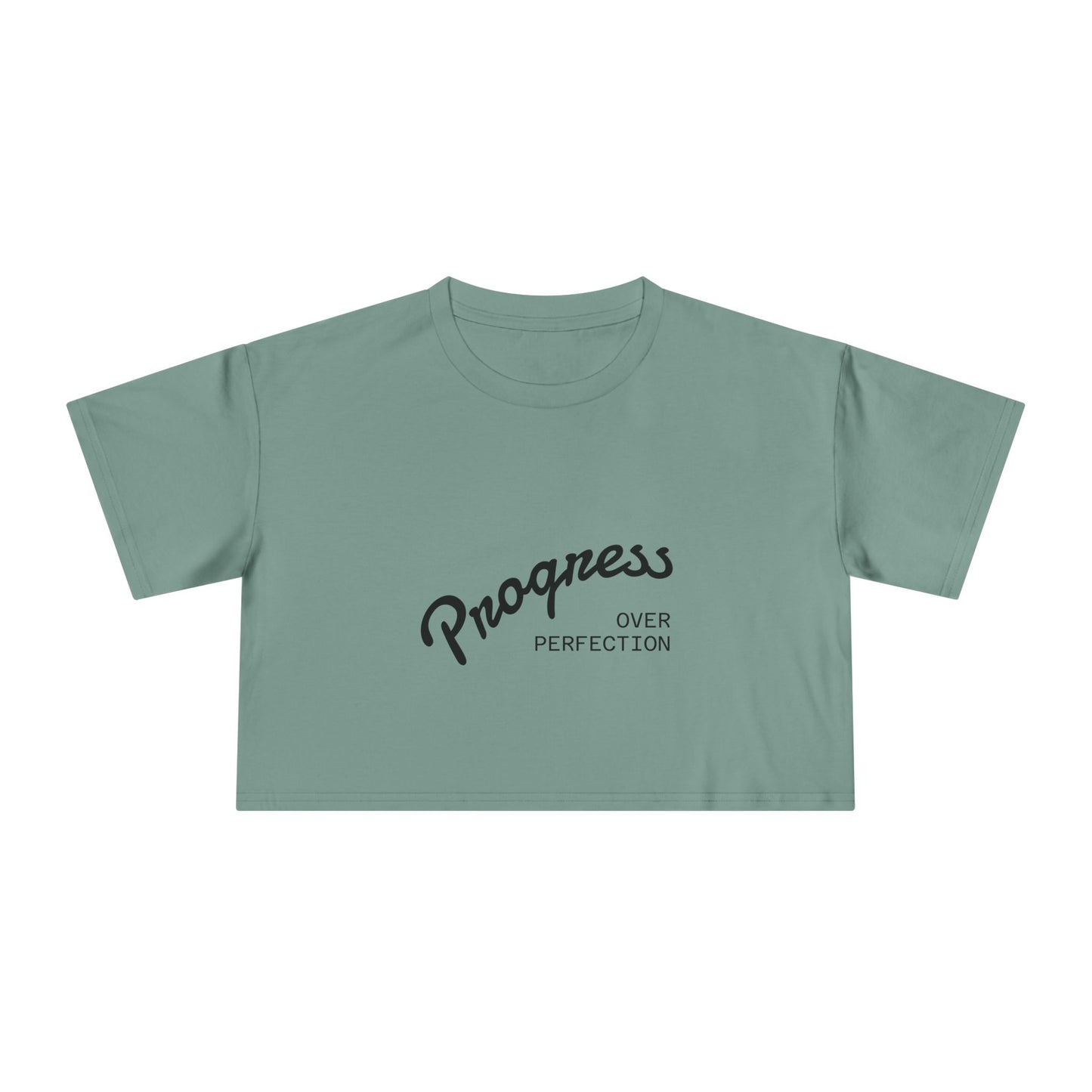 Green t-shirt with 'Progress Over Perfection' text on a white background