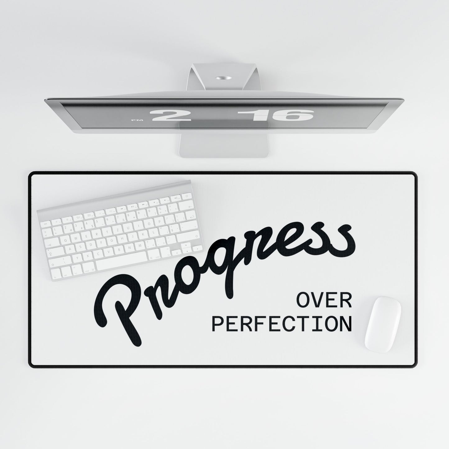 Progress Over Perfection large mouse pad angled view white background product shot