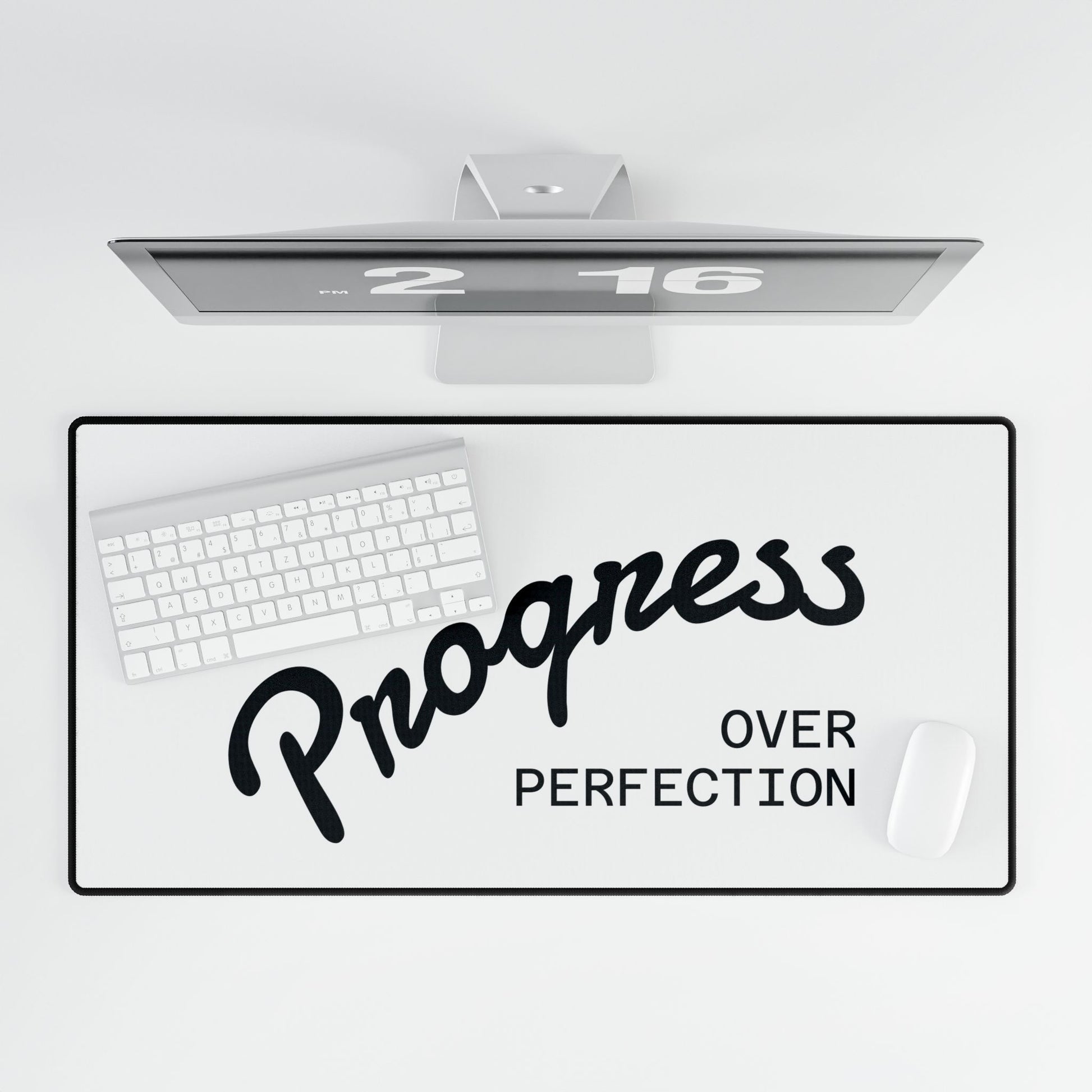 Progress Over Perfection large mouse pad angled view white background product shot