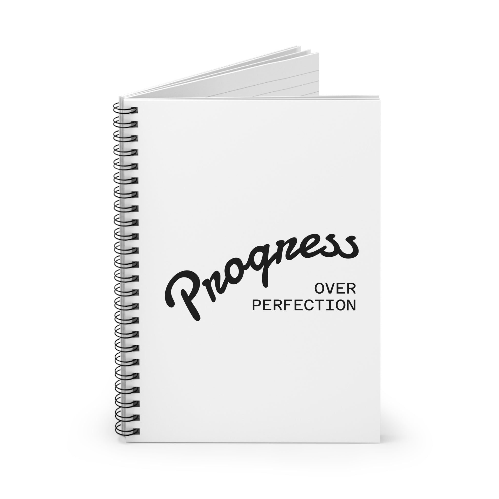 Progress over perfection spiral notebook angled view, premium white journal for daily planning and mindset development
