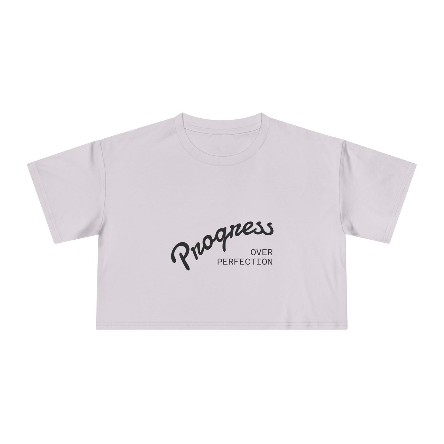 White crop top with 'Progress Over Perfection' text on a white background