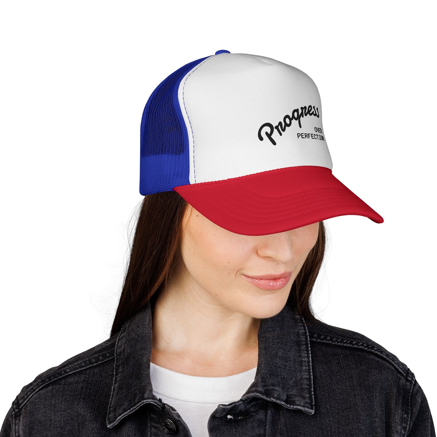 Woman wearing Progress Over Perfection red white blue trucker hat front view
