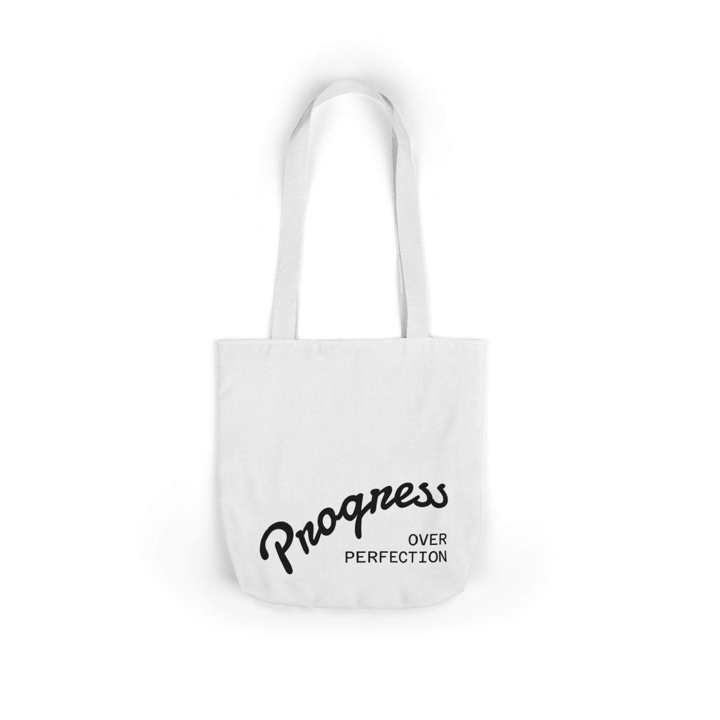  White canvas tote bag with Progress Over Perfection inspirational quote flat lay