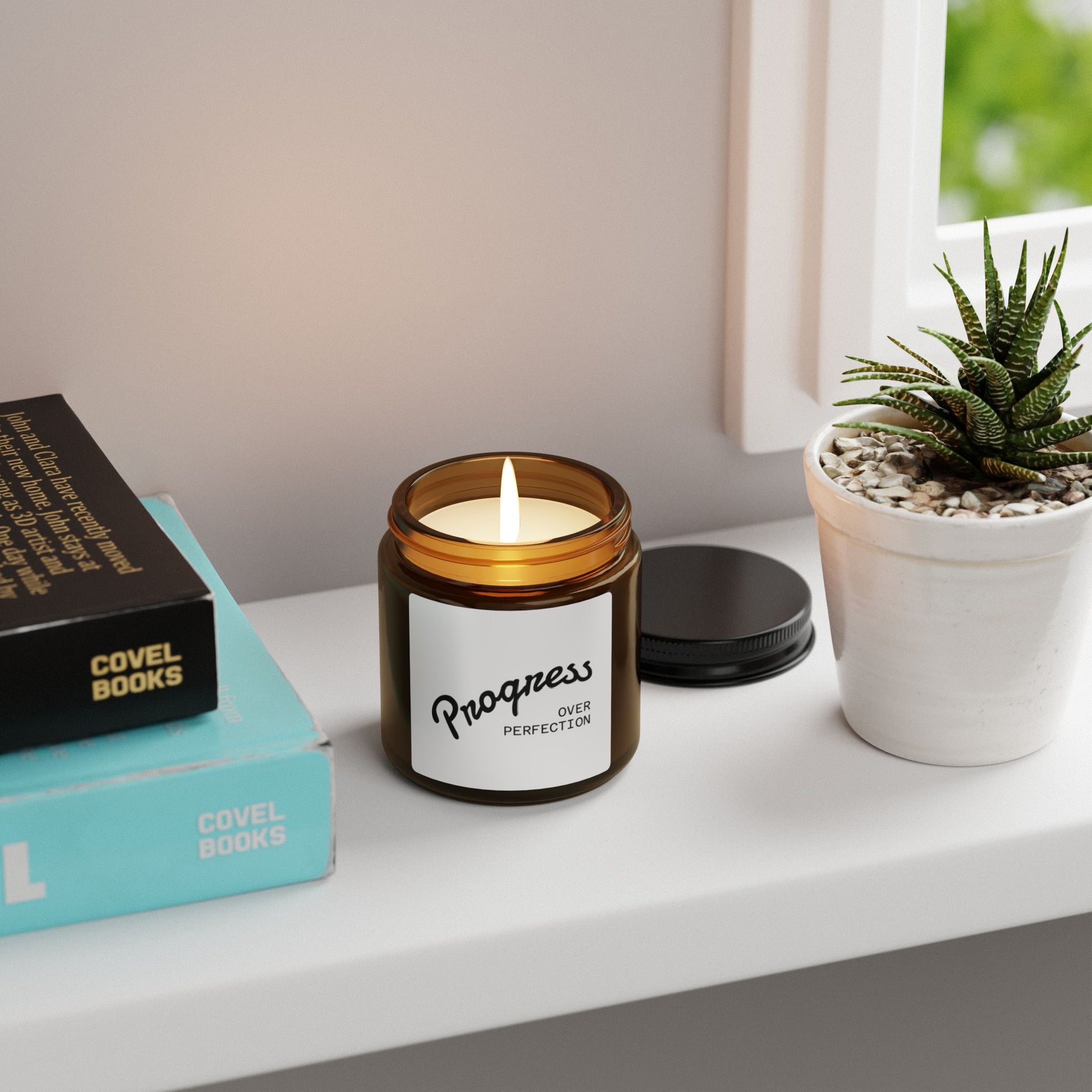 Progress Over Perfection candle on bathroom counter with plants self-care wellness decor