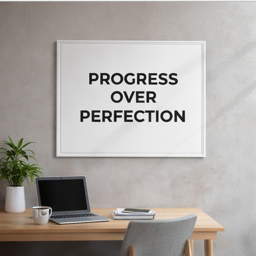Progress Over Perfection framed canvas wall art on home office desk motivational decor