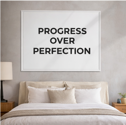 Progress Over Perfection framed print above bed bedroom wall art motivational decor