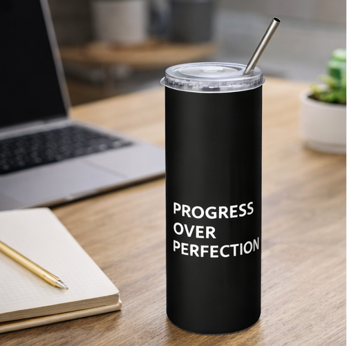 Progress Over Perfection black tumbler on desk with notebook motivational office drinkware