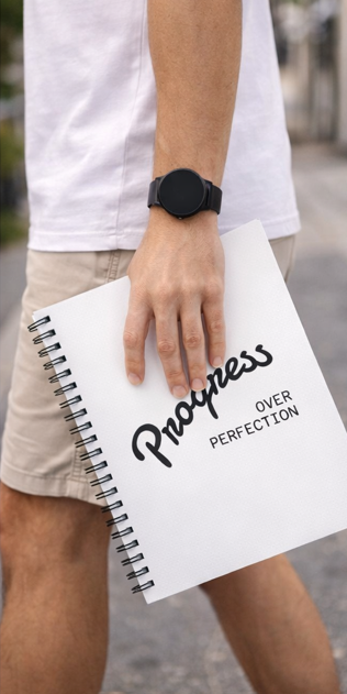 Progress over perfection spiral notebook with fitness watch, motivational planner for workout tracking and goal planning
